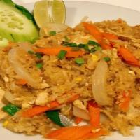 Fried Rice · With egg, carrots, onions, tomatoes, peas and cashew nuts.