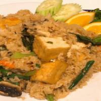 Fried Rice Basil · Stir-fried jasmine rice with basil, garlic, mushrooms, carrots, bell peppers, onions, jalape...