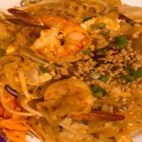Pad Thai · Rice noodle with shrimp, tofu, egg, sprouts, nuts, scallions and lime.