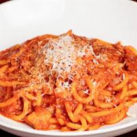 Spaghettoni Amatriciana · Pancetta, Spicy Tomato Sauce, Sweet Onion
Garlic and Pecorino cheese