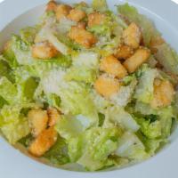 Caesars Salad · Crispy romaine lettuce toast with anchovy garlic, olive oil dressing topped with garlic crot...