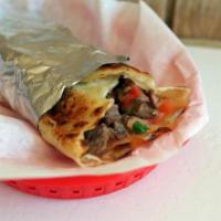 Steak (Q) · Flour (10 inch) tortilla fried with cheese and with steak and pico de gallo