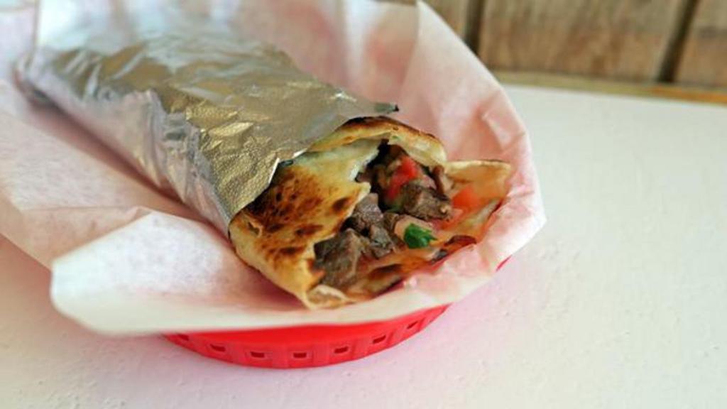 Steak (Q) · Flour (10 inch) tortilla fried with cheese and with steak and pico de gallo