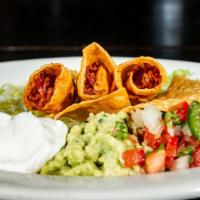 Chicken Flautas · Filled with chicken, fried to a crispy, sour cream, guacamole, salsa.