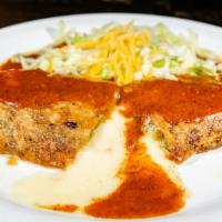 Chile Relleno · Roasted long green chile stuffed with montery jack cheese with a light egg batter, topped wi...