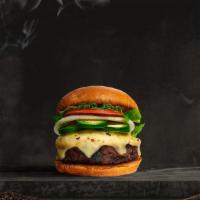 Justice Jalapeno Burger · Seasoned Beyond meat patty topped with melted vegan cheese, jalapenos, lettuce, tomato, onio...