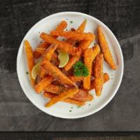 Sweet Bite Potato Fries · Thick-cut sweet potato wedges fried until golden brown