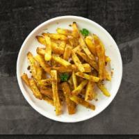 Garlic Grip Fries · Idaho potato fries cooked until golden brown and garnished with salt and garlic.