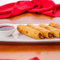 V. Crispy Spring Rolls (4 pcs.) · Silver noodles, carrots, and cabbages served with sweet & sour sauce.