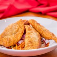 V. Thai Samosa (5 pcs.) · Crispy wrap with mixed with potato, onion and
curry powder served with cucumber salad.
