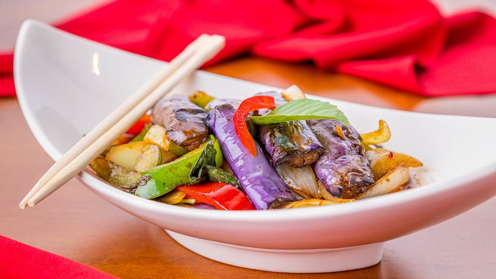 V. Eggplant · Sautéed with eggplants, onions, bell peppers, and basil.