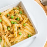 Truffle Mac and Cheese · With English peas and parmesan