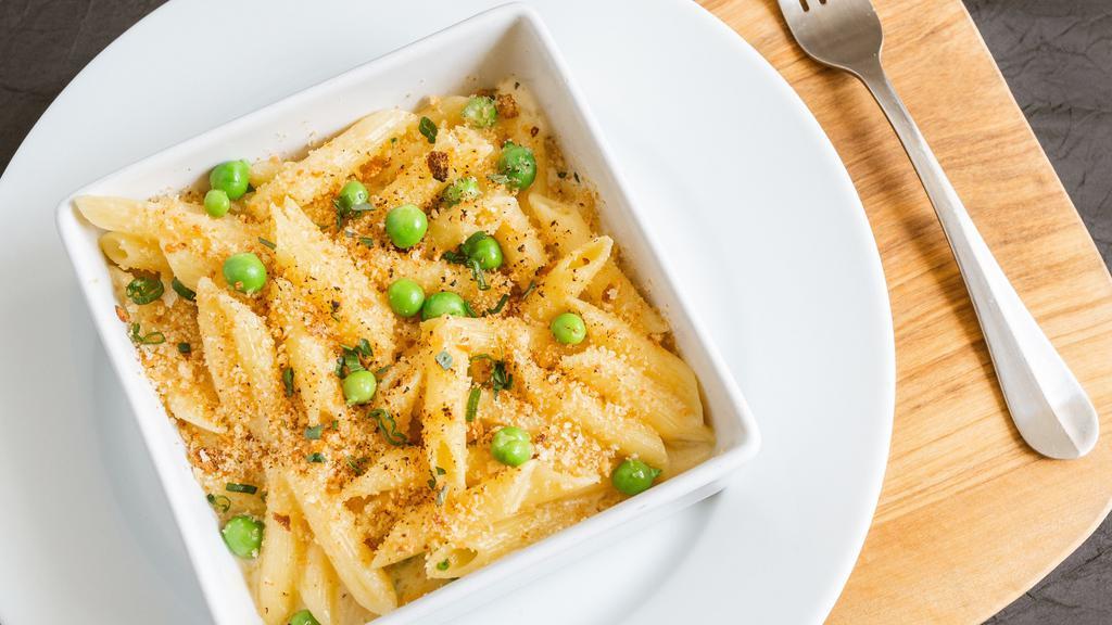 Truffle Mac and Cheese · With English peas and parmesan