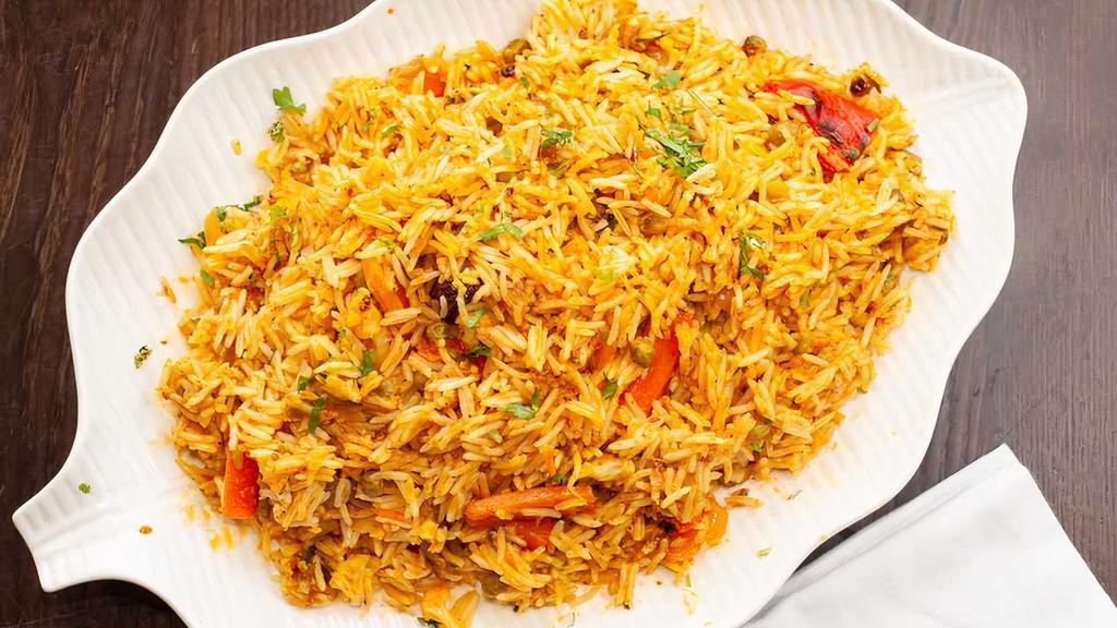 Veg. Biryani · mix vegetables cooked with basmati rice and spices
