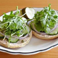 Veggie Bagel Sandwich * · (served open-faced) veggie cream cheese, salted cucumber, capers, red onion & greens