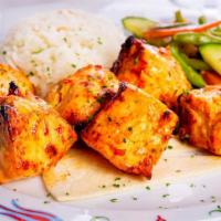 Chicken Shish Kebab · Hearty chicken kabobs, hummus, green salad, rice, and warm pita bread.