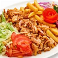 Chicken Gyro Salad · Juicy chicken gyro, cucumbers, tomatoes, and olives on a bed of fresh greens tossed with lem...