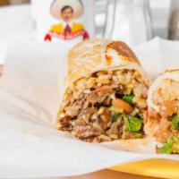 Super Burritos · Your choice of meat in flour tortilla with cilantro, rice, onion, cheese, guacamole, sour cr...