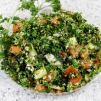 Tabbouleh Salad · Cracked wheat salad made from finely blended and chopped parsley, tomatoes, cucumbers, and f...