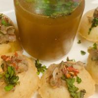 Paani Puri · ( crispy shell filled with potato, mint tamarind sauce and yogurt )