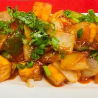 Chili Paneer · Deep fried paneer tossed with onion, bell pepper and chili garlic sauce.