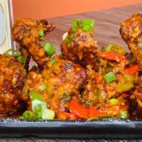 Mango Chilli Drumstick · Chicken drumstick marinate in spices and deep fried.