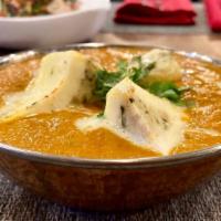 Paneer Pasanda · Cottage cheeses stuffed with onion, cilantro, cashew and cooked in a tomato creamy sauce.
