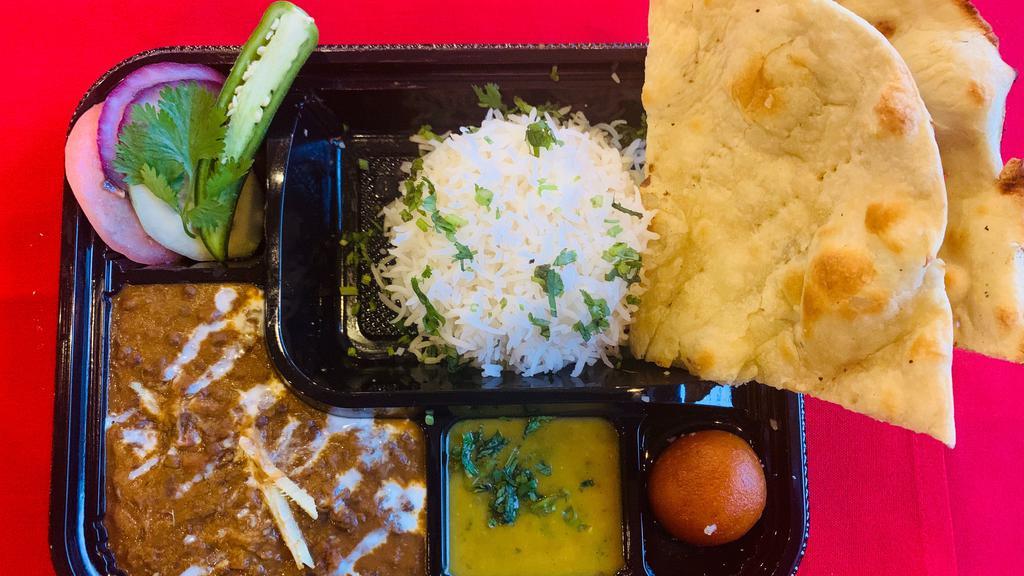 Veg-Bento Box · The Box comes with salad,Veg Entree,Rice , Daal , Bread and Desert