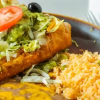 Chimichanga · A large flour tortilla filled with beef, chicken or pork. Deep fried and topped with guacamo...