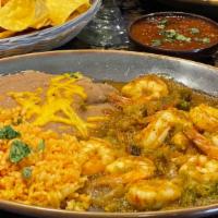 Camarones Rancheros · Prawns sautéed in butter, then simmered in red ranchera sauce, with a slight flavor of pican...