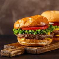 Cheeseburger · Delicious Cheeseburger freshly prepared and cooked to perfection. Topped with melted cheese,...