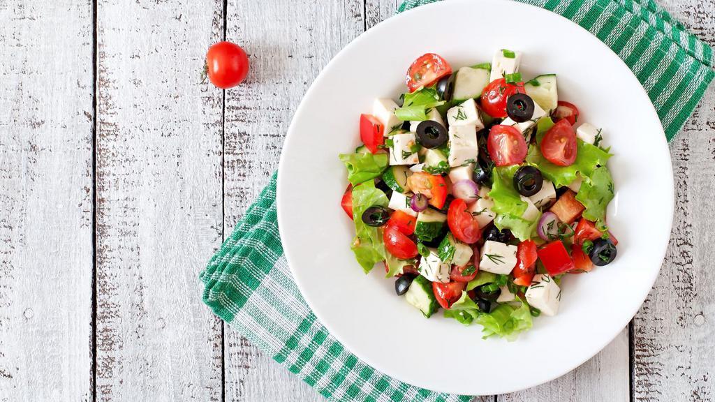 Greek Salad with Chicken · Fresh Romaine lettuce with Grilled chicken, tomatoes, cucumbers, red onions, feta cheese, banana peppers, olives, olive oil, and salad dressing.
