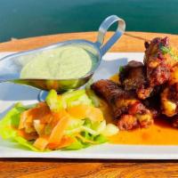 Chicken Wings · crispy wings, celery, chipotle glaze, herbed ranch dip