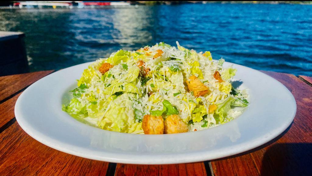 Classic Caesar · Romaine lettuce, croutons, garlic anchovy dressing, shaved parmigiano-reggiano.