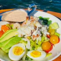 Lake Chalet Louis with Dungeness Crab & Shrimp · Garden lettuces, lemon vinaigrette, citrus, tomato, avocado, boiled egg, louie dressing with...