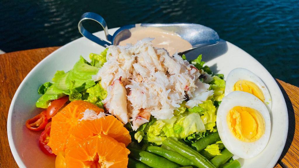 Lake Chalet Louie with Dungeness Crab · Garden lettuces, lemon vinaigrette, citrus, tomato, avocado, boiled egg, louie dressing with 3 ounces of Dungeness Crab.