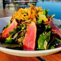 Seared Ahi Tuna Salad · blackened seared rare, field greens, asian slaw, 
soy vinaigrette, cilantro