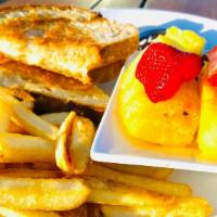 Kids Grilled Cheese  · Grilled cheese sandwich with fresh fruit and French fries