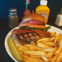 Hickory Brisket & Burger · 1/2 lb. Niman Ranch beef, topped with homemade BBQ sauce, eye round steak, apple wood bacon,...