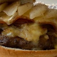 Marina Burger  · 1/2 lb. Niman Ranch beef, with apple wood bacon, caramelized onions, Brie cheese, topped wit...