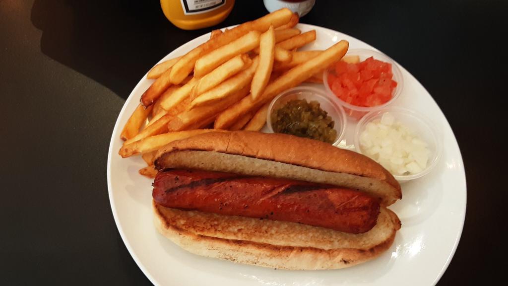 Jumbo Kosher Dog      · 100% kosher beef hot dog on a hot dog bun with chopped tomatoes, and onions on the side,