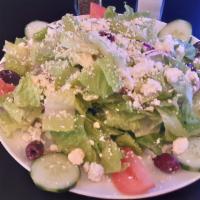 Greek salad · Romaine Hearts, tomato, cucumber, red onion, feta cheese, Kalamata olives, lemon juice, and ...