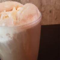 Mug Root Beer Float · Classic vanilla ice cream.