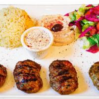 Kofte Kebab · Grilled patties made of ground lamb and beef with peppers, onions, garlic and parsley.
