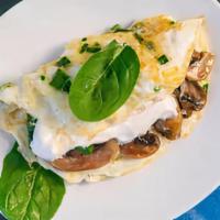 Body Builder Omelette · whipped egg whites, sautéed spinach and mushrooms, chives, topped with fat-free cream cheese
