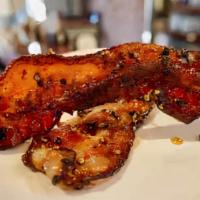 Maple Peppered Bacon · 100 % maple syrup, cracked pepper marinated smoked bacon!
