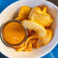 Sidewinder Fries. · shaved fries, twisted sauce