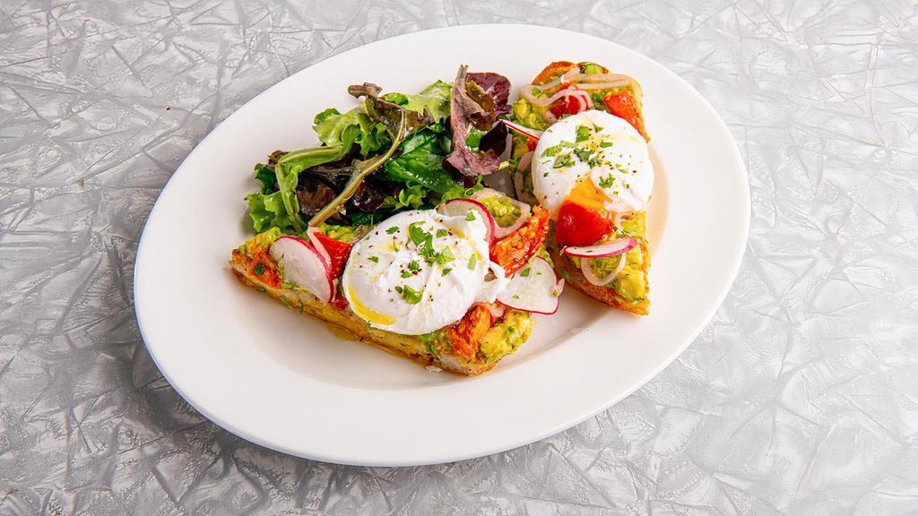 Avocado Toast · Grilled Artisan Bread topped with Fresh Avocado, Oven Roasted Tomatoes, Marinated Shallots, Radish, Spring Lettuce tossed with Shallot Vinaigrette and two Poached Eggs