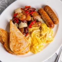 Umami Egg Breakfast · Two Farm Fresh Eggs, Breakfast Potatoes, Bacon or Sausage and Toast