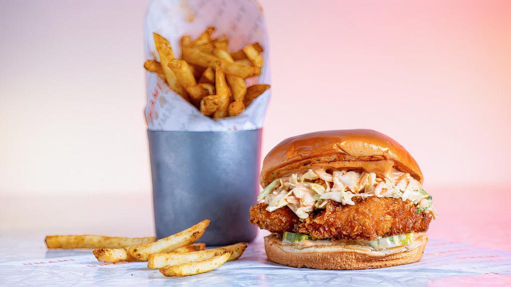 Brunch Sam's Crispy Chicken Sandwich · Cornflake Crusted Chicken Breast seasoned in our signature Sam's New Orleans style spice in between a toasted Brioche Bun with Pickles, Umami Slaw, Classic Sauce served with Thin Fries and Truffle Ketchup